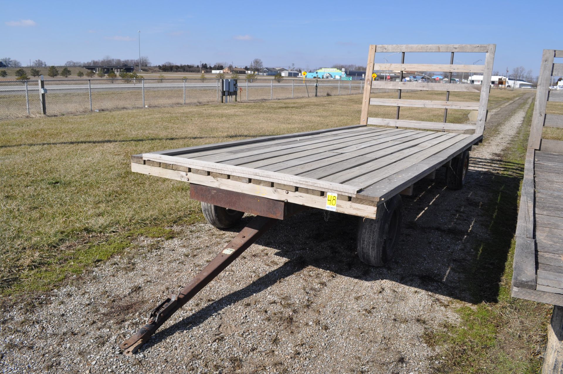 20' flat rack hay wagon, rear standards, on gear