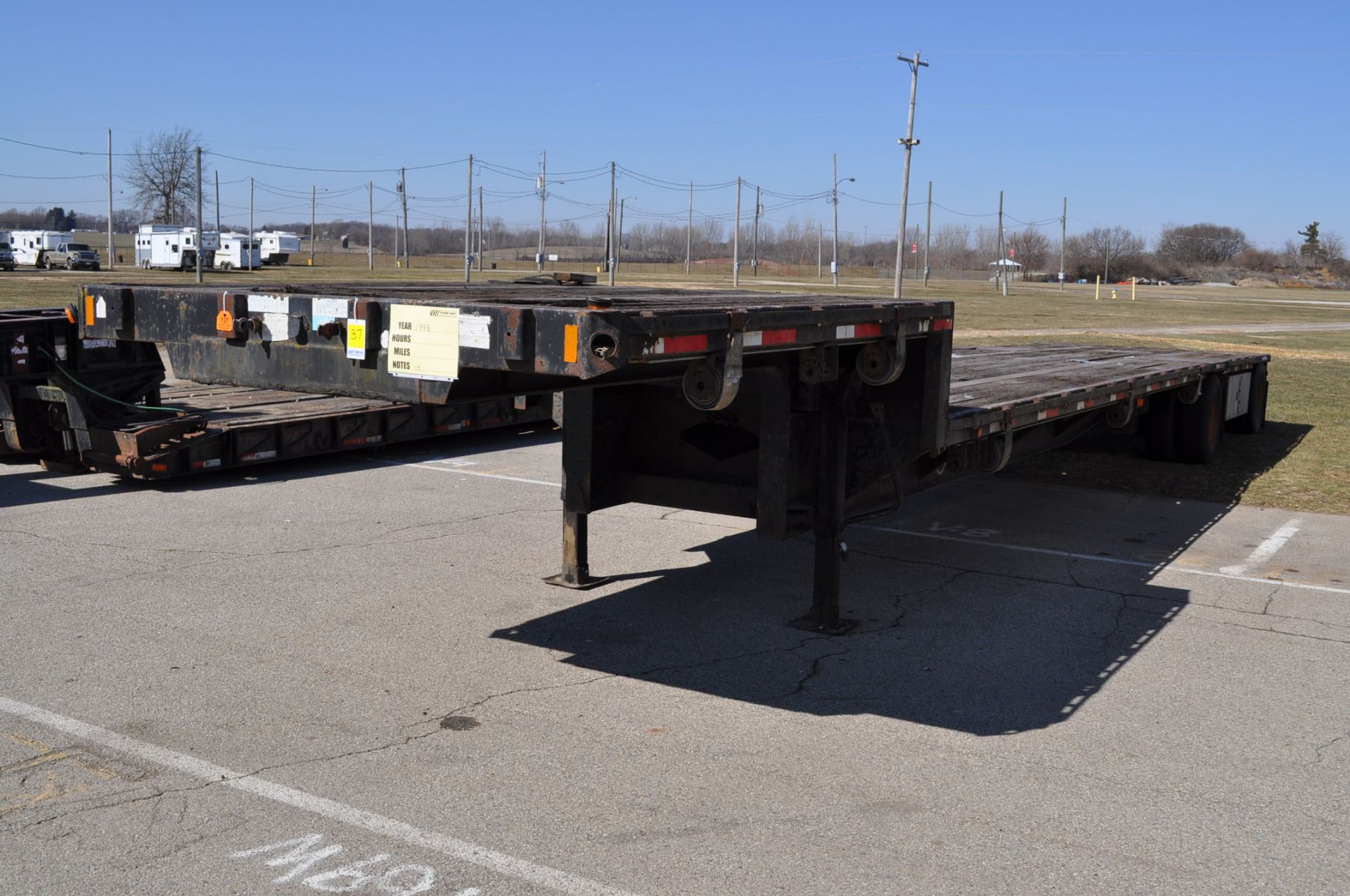 1998 48’ Fontaine drop-deck trailer, 10’ neck, 38’ drop, 10’ spread axles