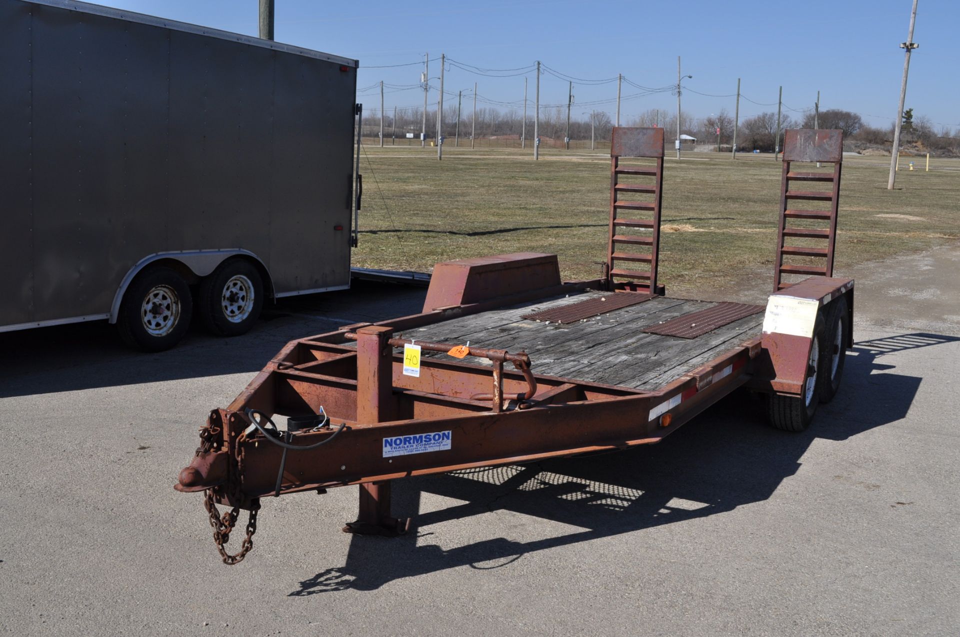 1998 Normson trailer, 14’x77”, bumper pull, tandem axle, drop gate