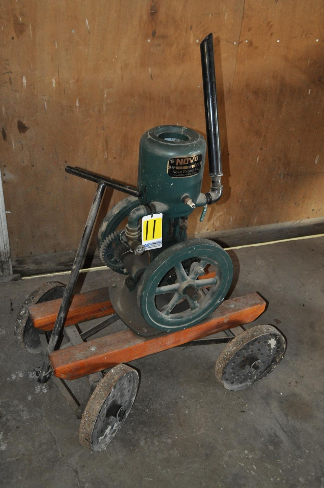 NOVA hit and miss engine on dolly cart with steel wheels