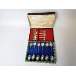Set of six Chinese silver coffee spoons 'Hong Kong' and another set Siamese, cased.