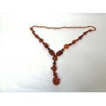 Victorian carved amber necklet.