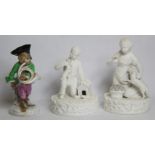 Two small Victorian or Edwardian Parian figures of a boy with pet rabbit and a girl with pet lamb,