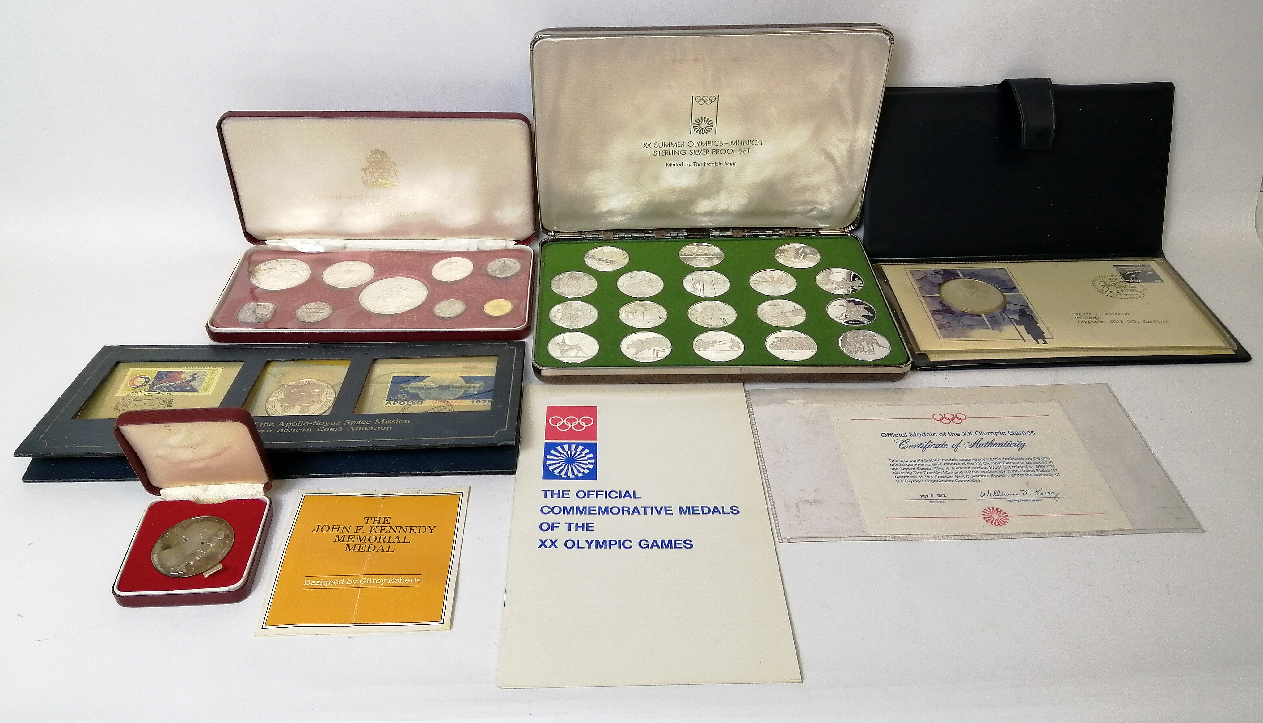 Set of eighteen Munich Olympics silver commemorative medals, approx. 250g, three others and a