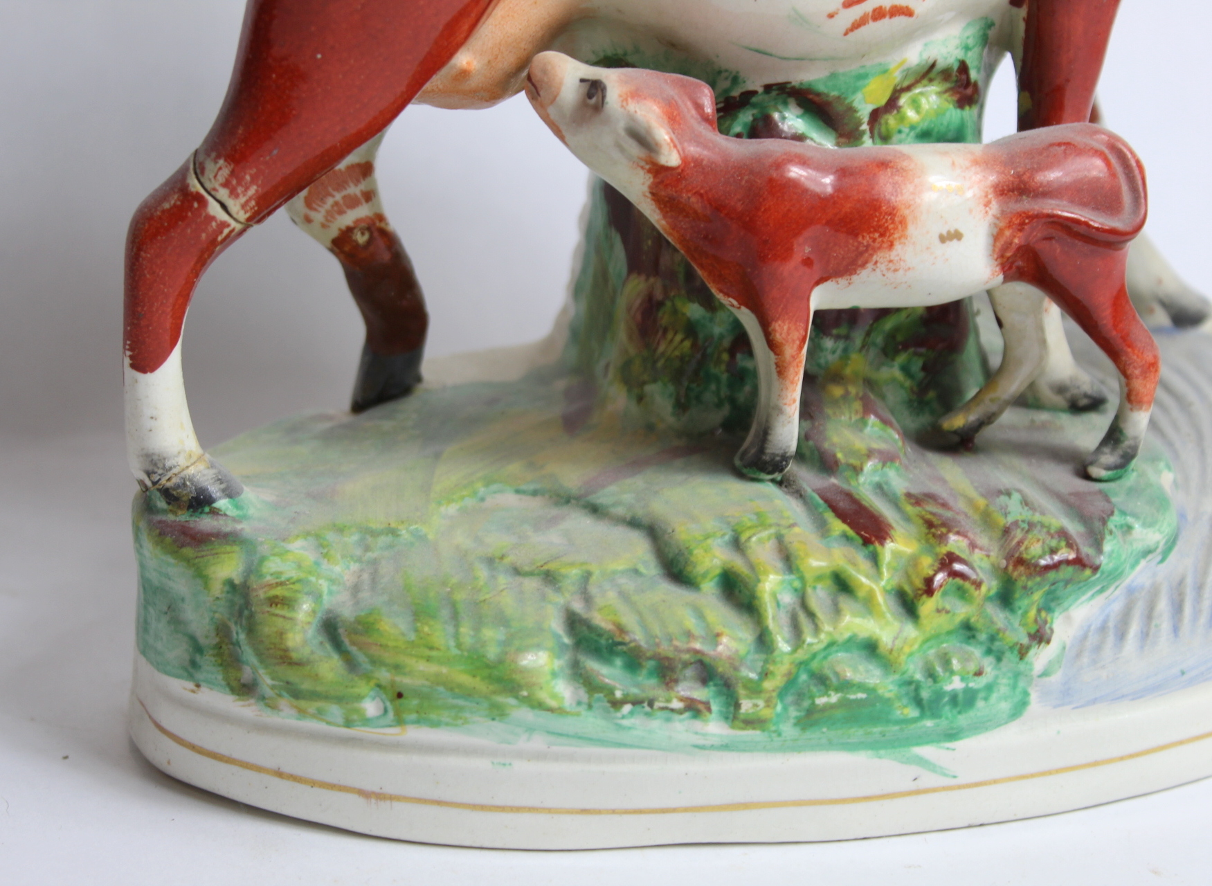 Two Staffordshire pottery spill vases in the form of a cow and calf on naturalistic plinth base with - Image 8 of 12