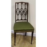 Edwardian inlaid mahogany bedroom chair with pierced splat on squared and turned supports.