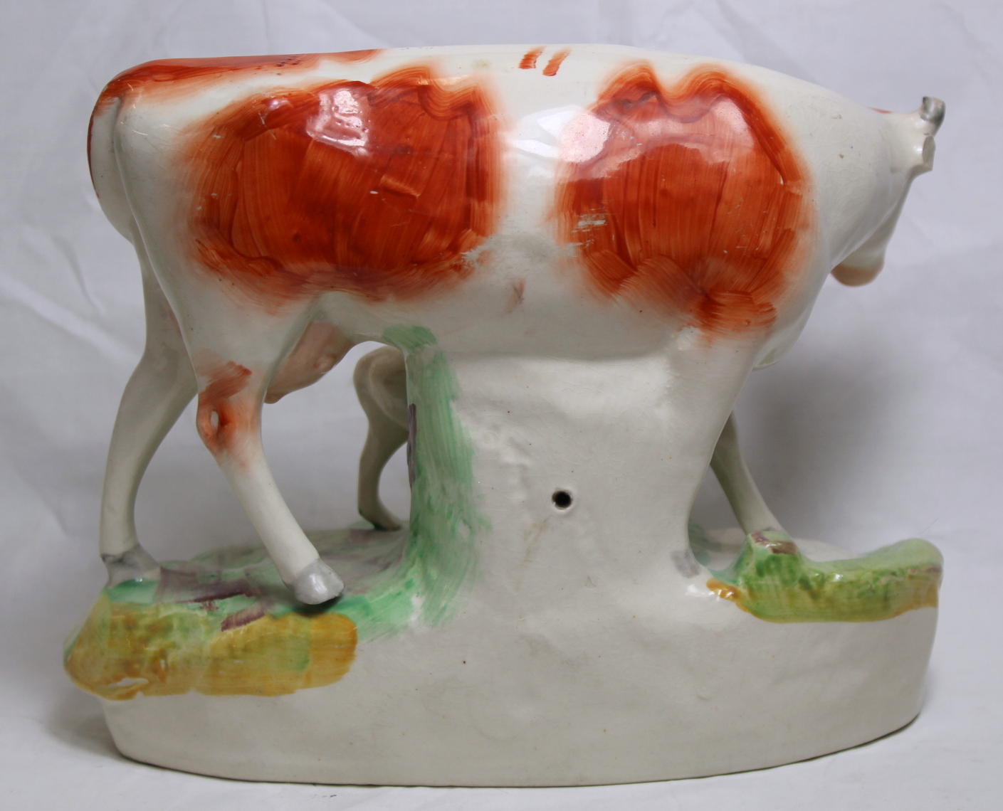 19th century Staffordshire pottery figure of a red and white cow and calf, on naturalistic oval - Image 3 of 7