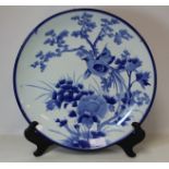 Late 19th/early 20th century Japanese blue and white charger decorated with birds amongst