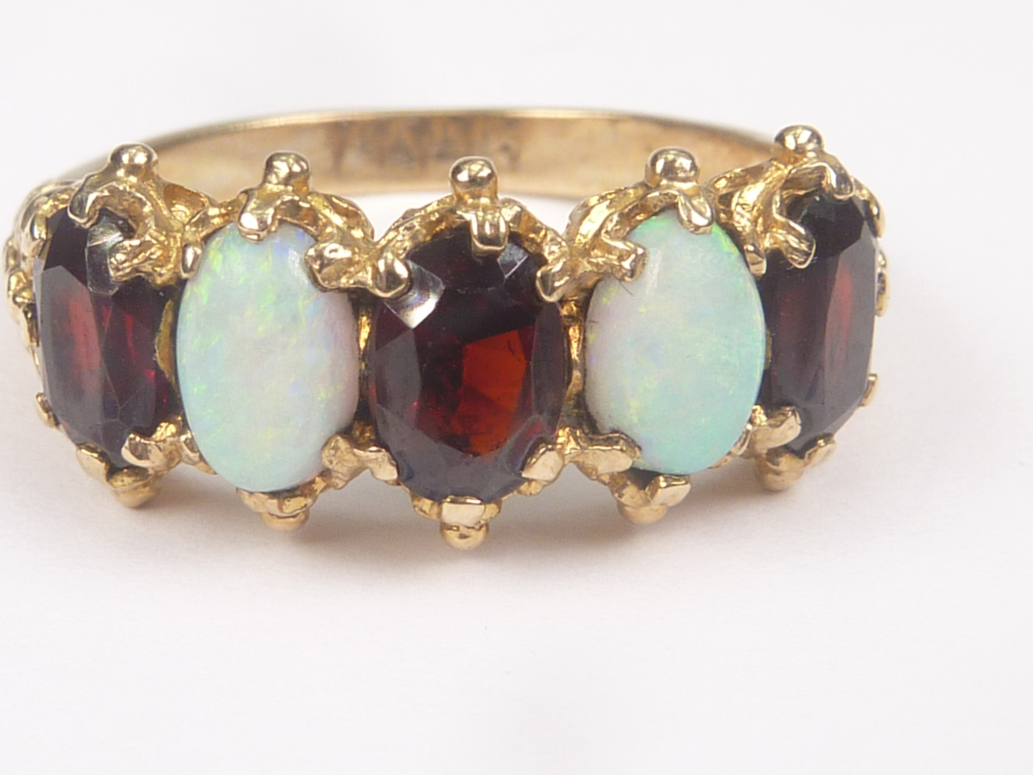 Garnet and opal five stone ring in 9ct gold, 1973. Size 'O½'. - Image 2 of 4
