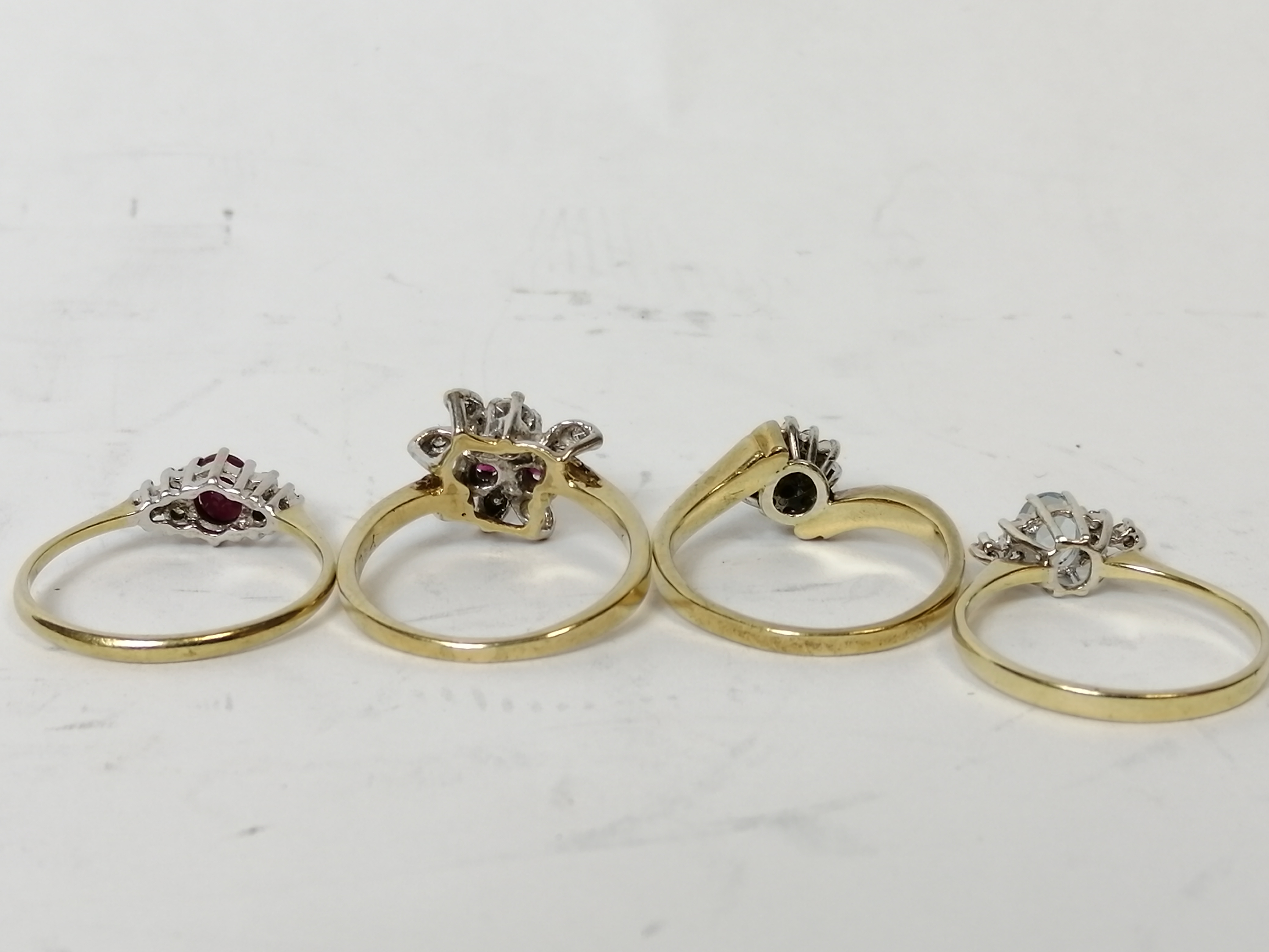 Two ruby and diamond rings, a diamond cluster ring and an aquamarine and diamond ring, all 9ct gold. - Image 2 of 4