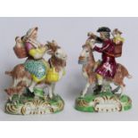Pair of 19th century Staffordshire pottery figures of the Welsh Tailor and his wife, each depicted