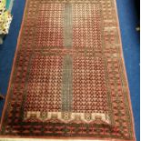 Eastern Ensi rug of "Princess Bokhara" design with four panels multiples rows of candlesticks, on