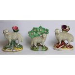 Victorian pottery figure of a lamb on naturalistic oval plinth base with stream and flowering tree