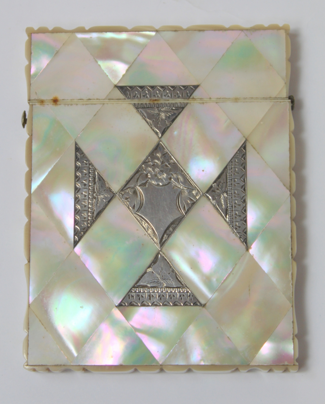 Victorian mother of pearl card case with engraved silver lozenge and triangles, c.1870.