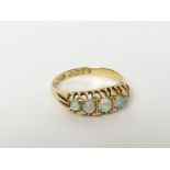 Five stone opal ring in 18ct gold, 1919. Size 'O'.