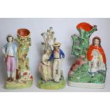 Staffordshire pottery figure group "The Sailor's Farewell", 30cm high and two flat back spill