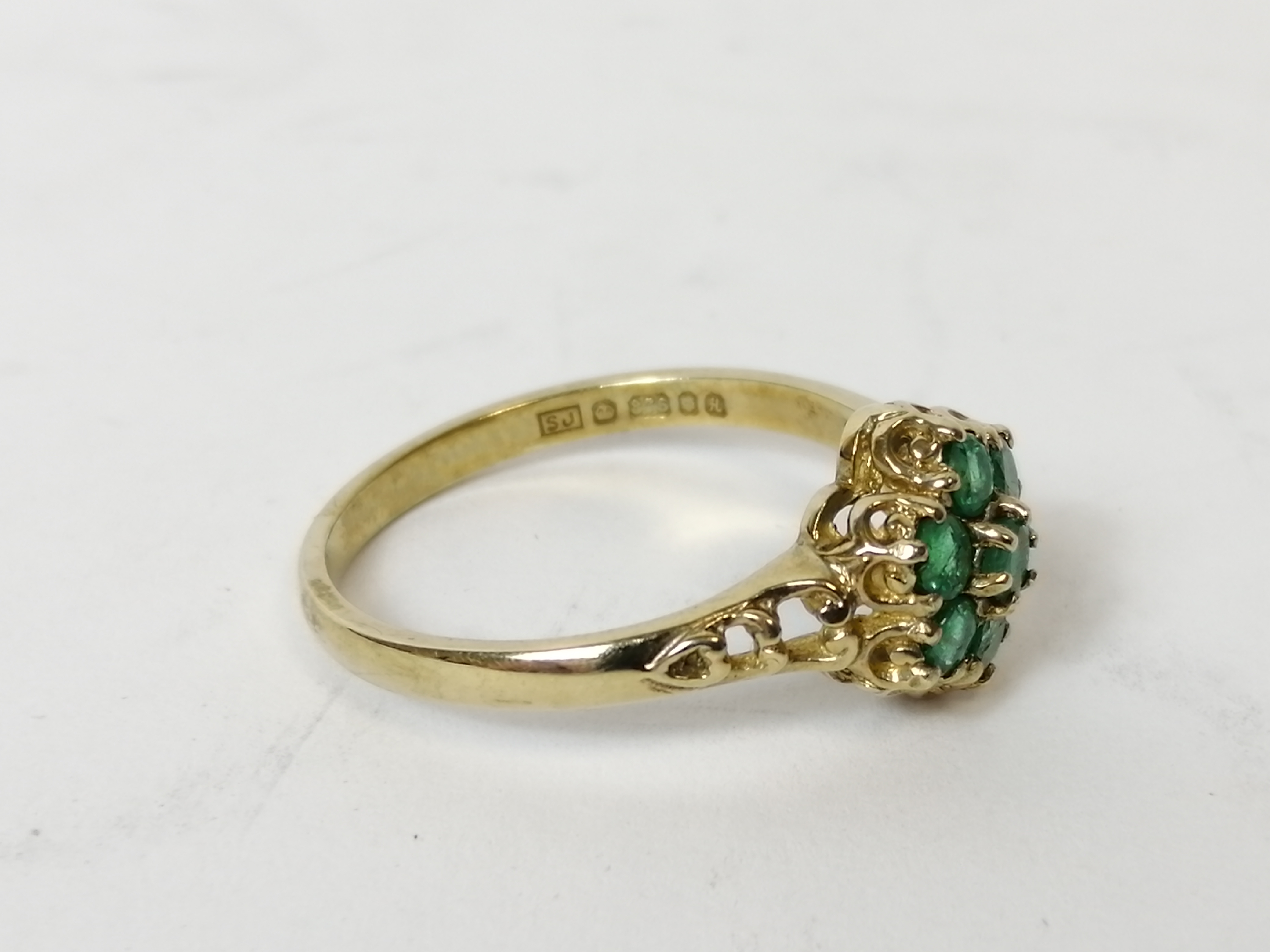 Emerald and diamond cluster ring, probably 18ct gold. Size 'M½'.