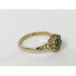 Emerald and diamond cluster ring, probably 18ct gold. Size 'M½'.
