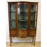 Edwardian inlaid mahogany display cabinet with central glazed bowed section flanked by astragal