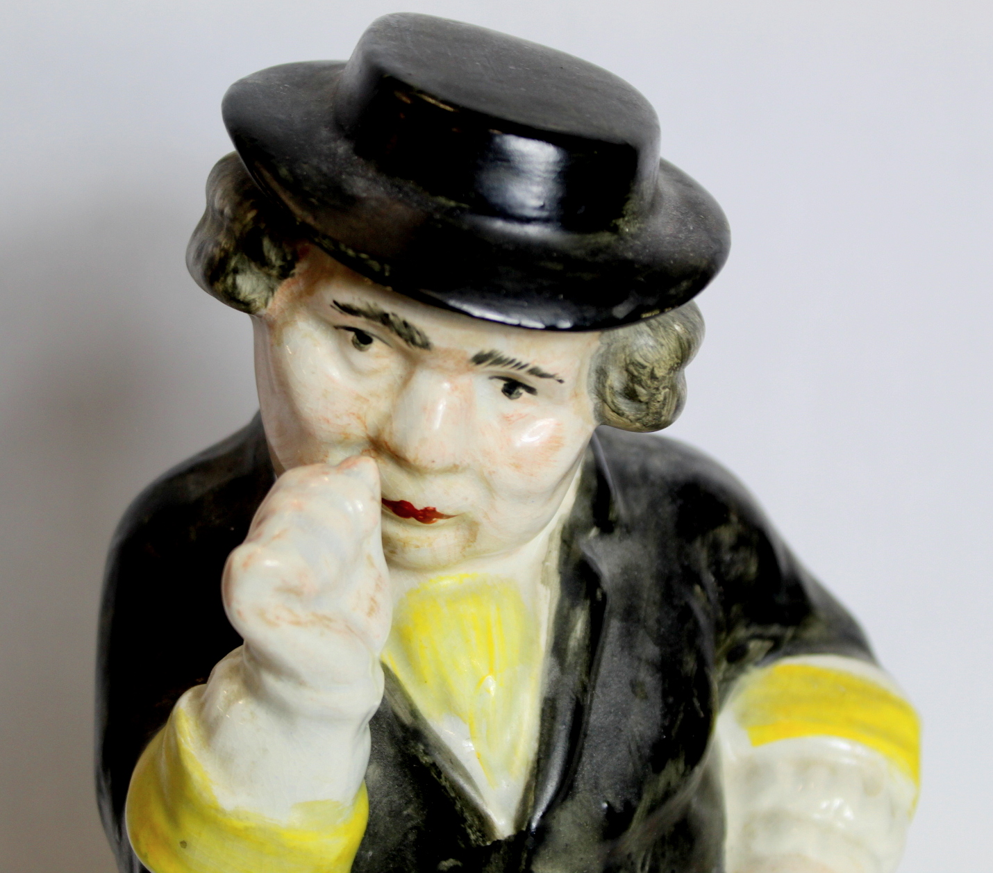 19th century pottery figure of a man taking snuff, standing on a kidney shaped plinth base, - Image 4 of 4