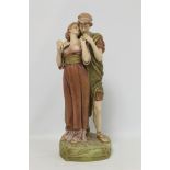Royal Dux porcelain figure group of two lovers, both in classical dress, by Alois Hampel,