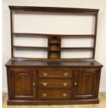 Antique oak dresser, the open plate rack with three central shelves, the base with half pilasters