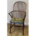 Windsor chair with spindle back, shaped seat on turned supports with stretcher