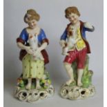 Pair of Stevenson & Hancock Derby porcelain figures of a shepherd and shepherdess, the boy with