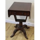 Regency mahogany work table, the rectangular drop flap top over two frieze drawers, on turned