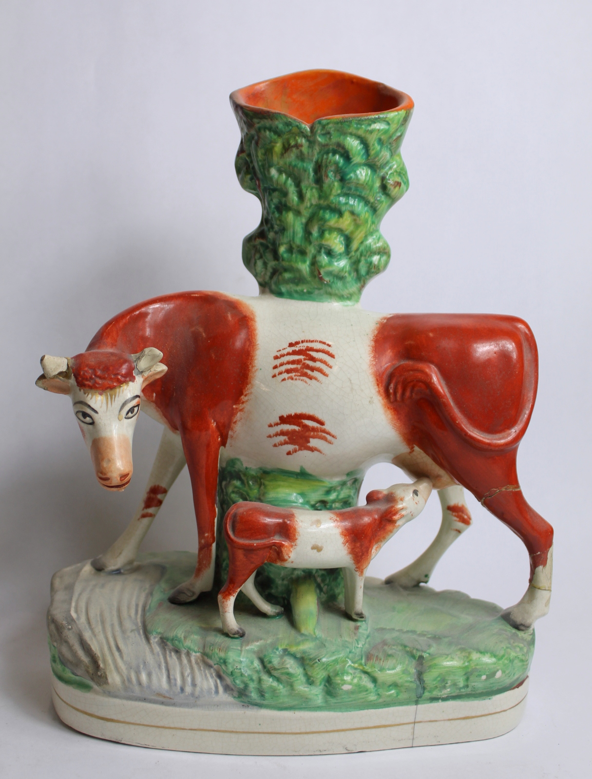 Two Staffordshire pottery spill vases in the form of a cow and calf on naturalistic plinth base with - Image 2 of 12
