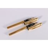 Sheaffer Targa rolled gold fountain pen and the matching ball point. (2).