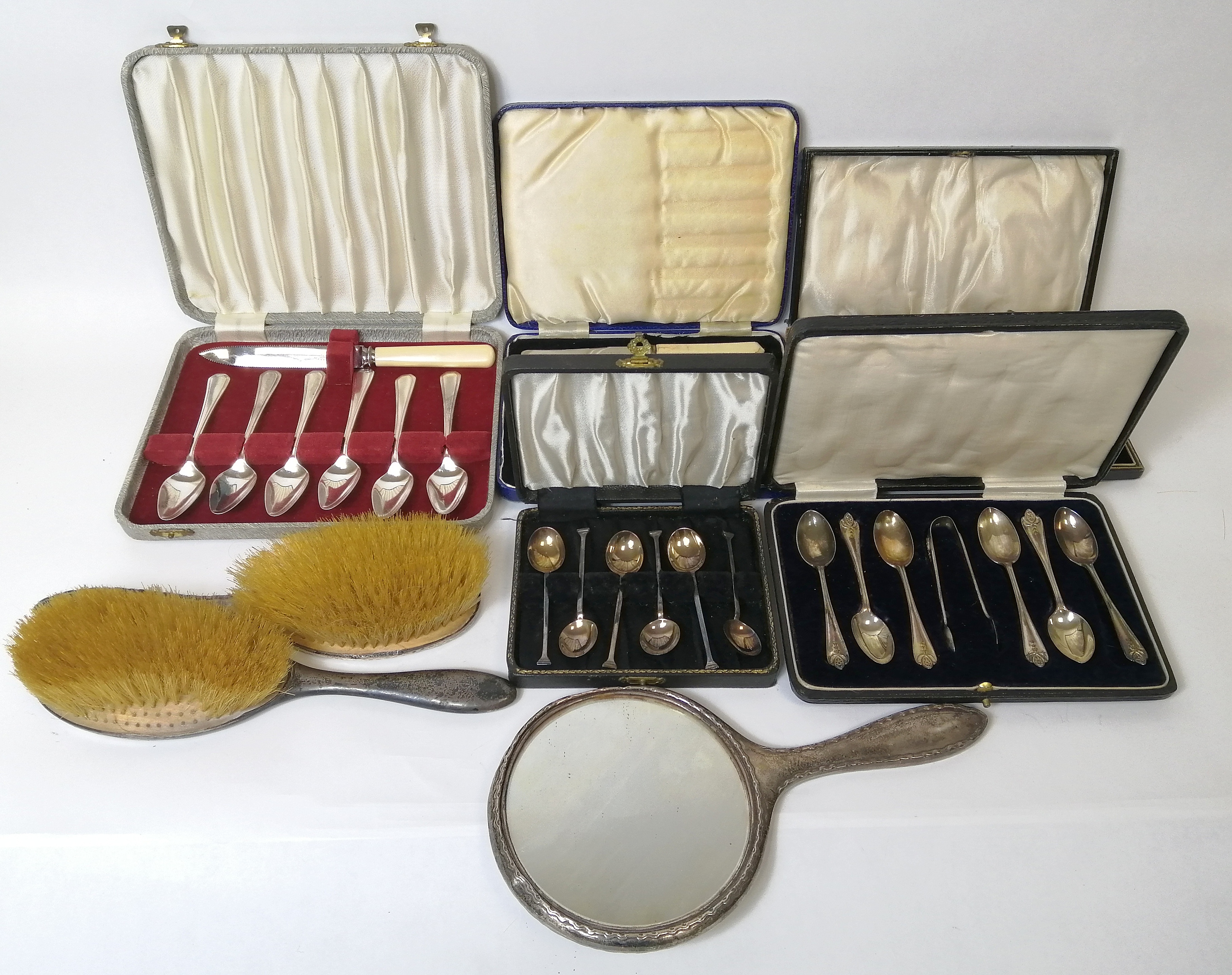 Three sets of silver coffee spoons and various silver and other articles.