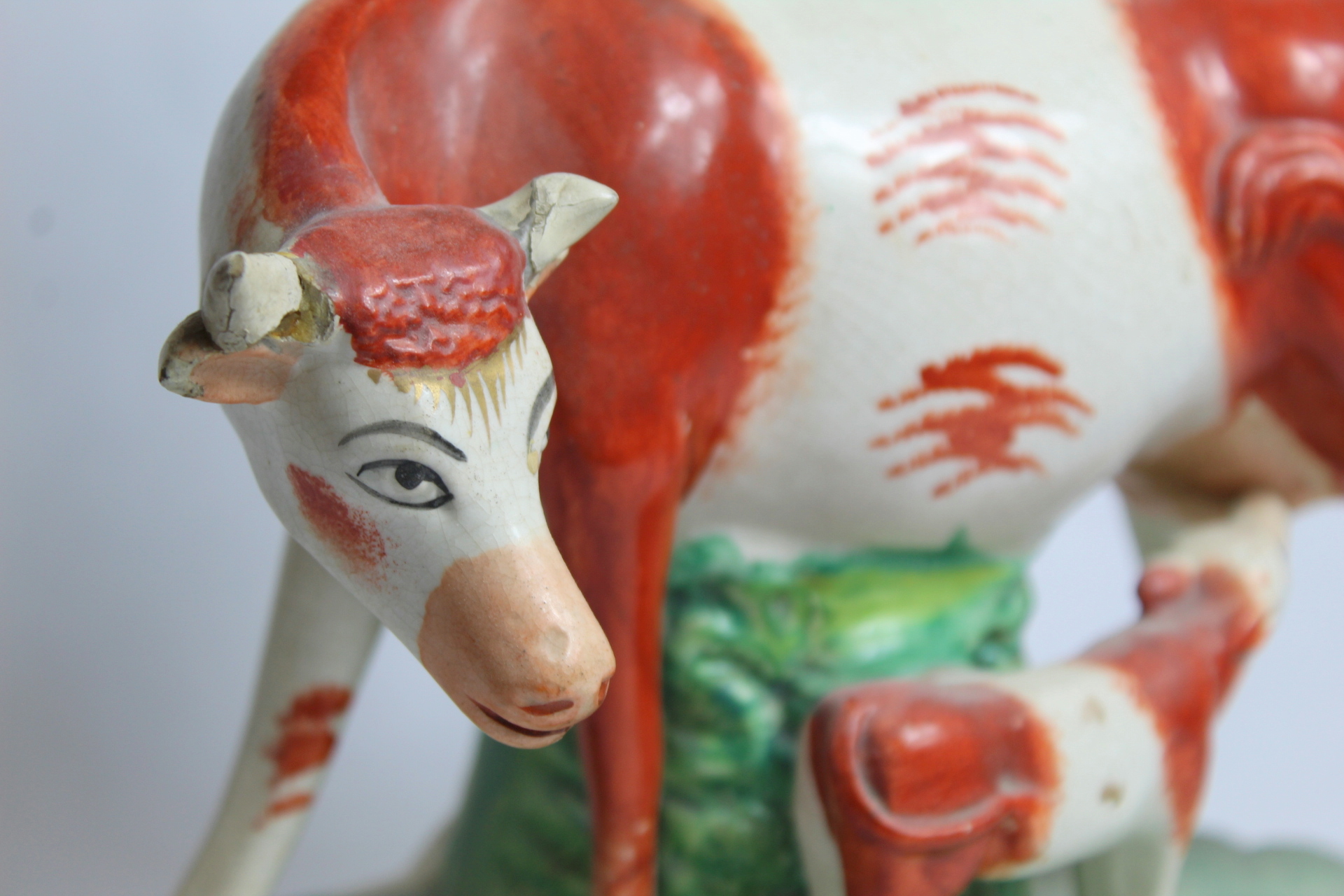 Two Staffordshire pottery spill vases in the form of a cow and calf on naturalistic plinth base with - Image 5 of 12