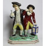 Late 18th/early 19th century Staffordshire pearlware figure group, "Vicar and Moses", the inebriated