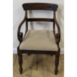 19th century mahogany carver chair with scroll arms and slip in seat on turned supports.