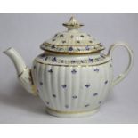 Late 18th century Chamberlain's Worcester teapot of new fluted oval form, decorated with blue floral