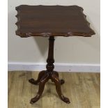 Mahogany tilt top square table on turned column and quadripartite base with pad feet. 56cm.