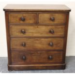 Victorian mahogany chest of two short over three long graduated drawers on bun supports. 112cm high,