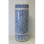 Large Chinese blue and white porcelain stick stand of cylindrical form with floral and foliate