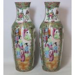 Pair of late 19th/early 20th century Chinese famille rose vases of slender reeded baluster form with