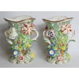 Pair of Derby porcelain pierced floral encrusted vases with lobed rim and foliate scroll handles,