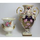 Early 19th century Derby porcelain twin handled vase of urn form with Imari decoration, painted
