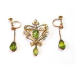 Edwardian gold brooch pendant with peridot and pearls, '9c', and a pair of similar earrings, 19g