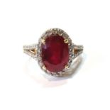 Ruby and white sapphire oval cluster ring in silver gilt, size Q.