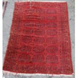Rug with three rows of seven guls over red ground, multiple border, multiple border, 171cm x 108cm.