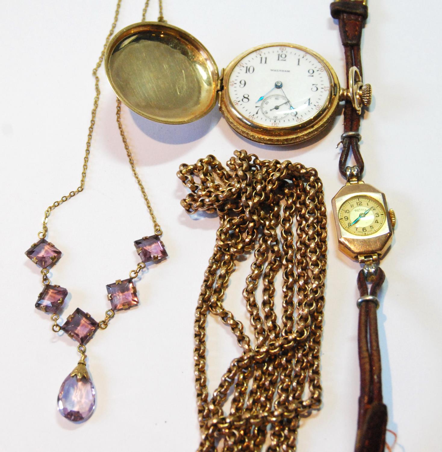 Waltham lady's watch in gold hunter case, '14k', a lady's 9ct Rotary watch, and two other rolled