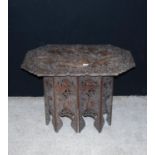 Ceylonese occasional table with elaborate floral carved top and stand, 83cm wide, 60cm high and 56cm