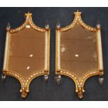 Pair of continental mirrors of rectangular form with tapering ends, beaded edges enclosing
