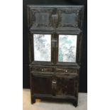 Chinese cabinet of rectangular form with pierced fretwork, mirrored doors, panelled doors and