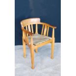 Edwardian oak tub chair with stepped top rail, hoop arms, shaped vertical splats over drop-in pad